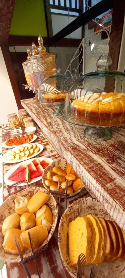 Bliss Hoteis Centro Búzios Exterior foto A selection of fruit and cake